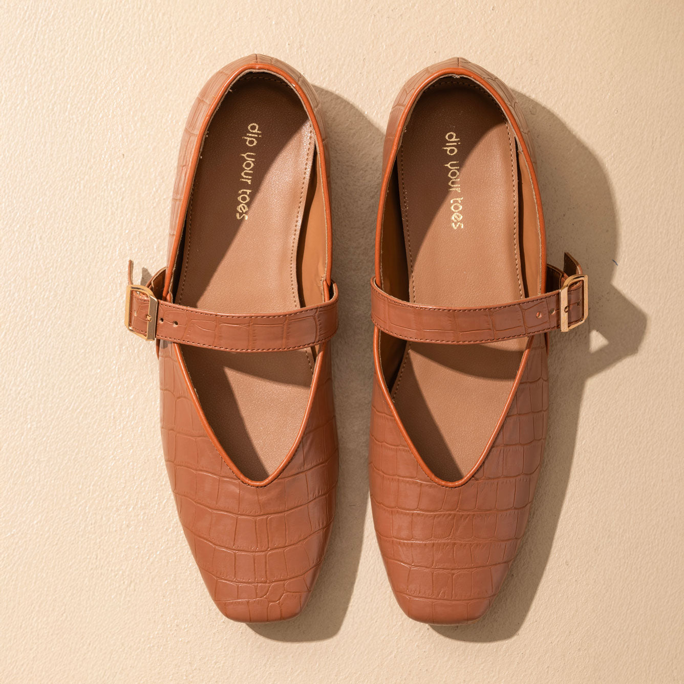 Tan textured Mary Jane Flats