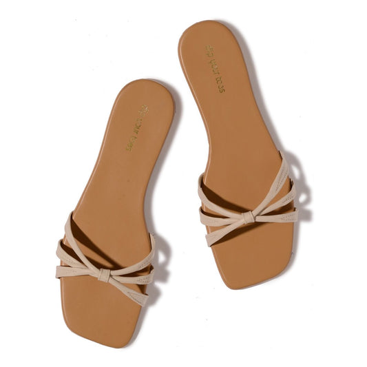 Tied in off white flats