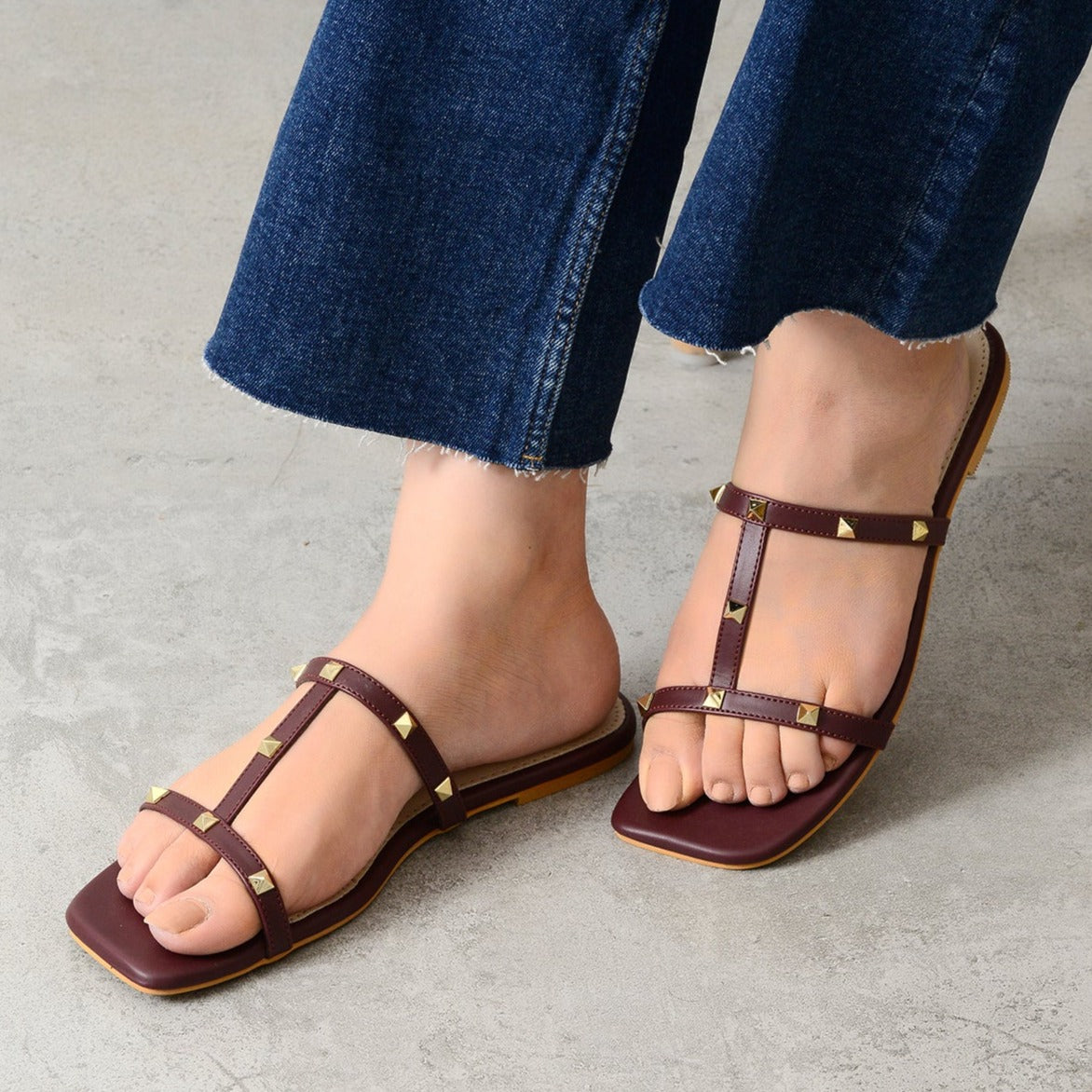 Maroon stud-embellished flats