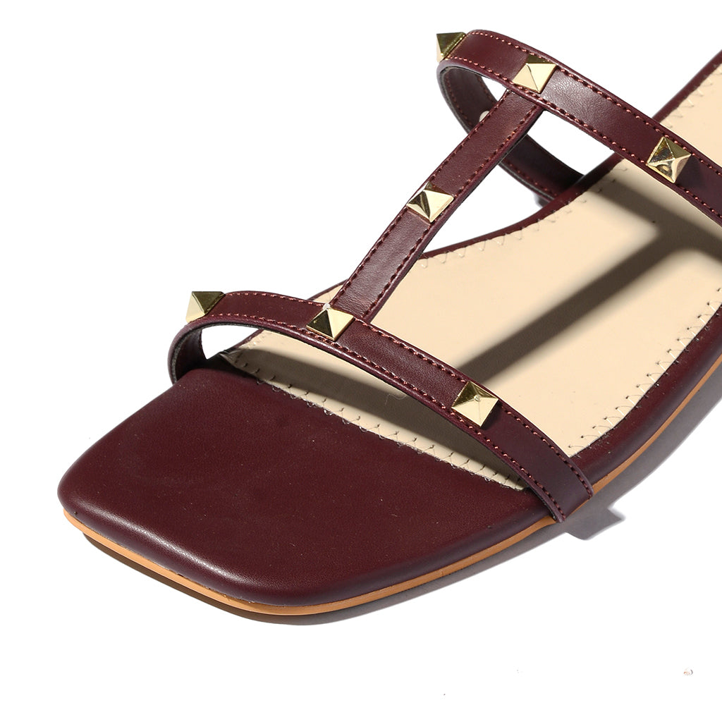 Maroon stud-embellished flats