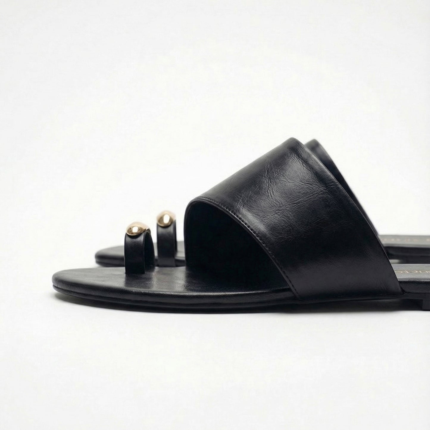 Black metal detail toe ring flats