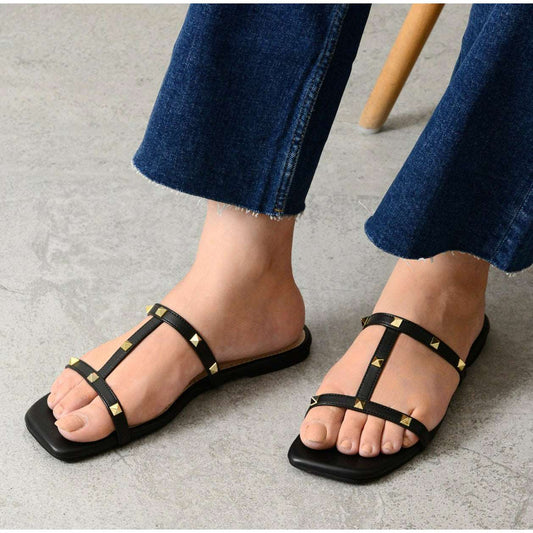 Black stud-embellished flats