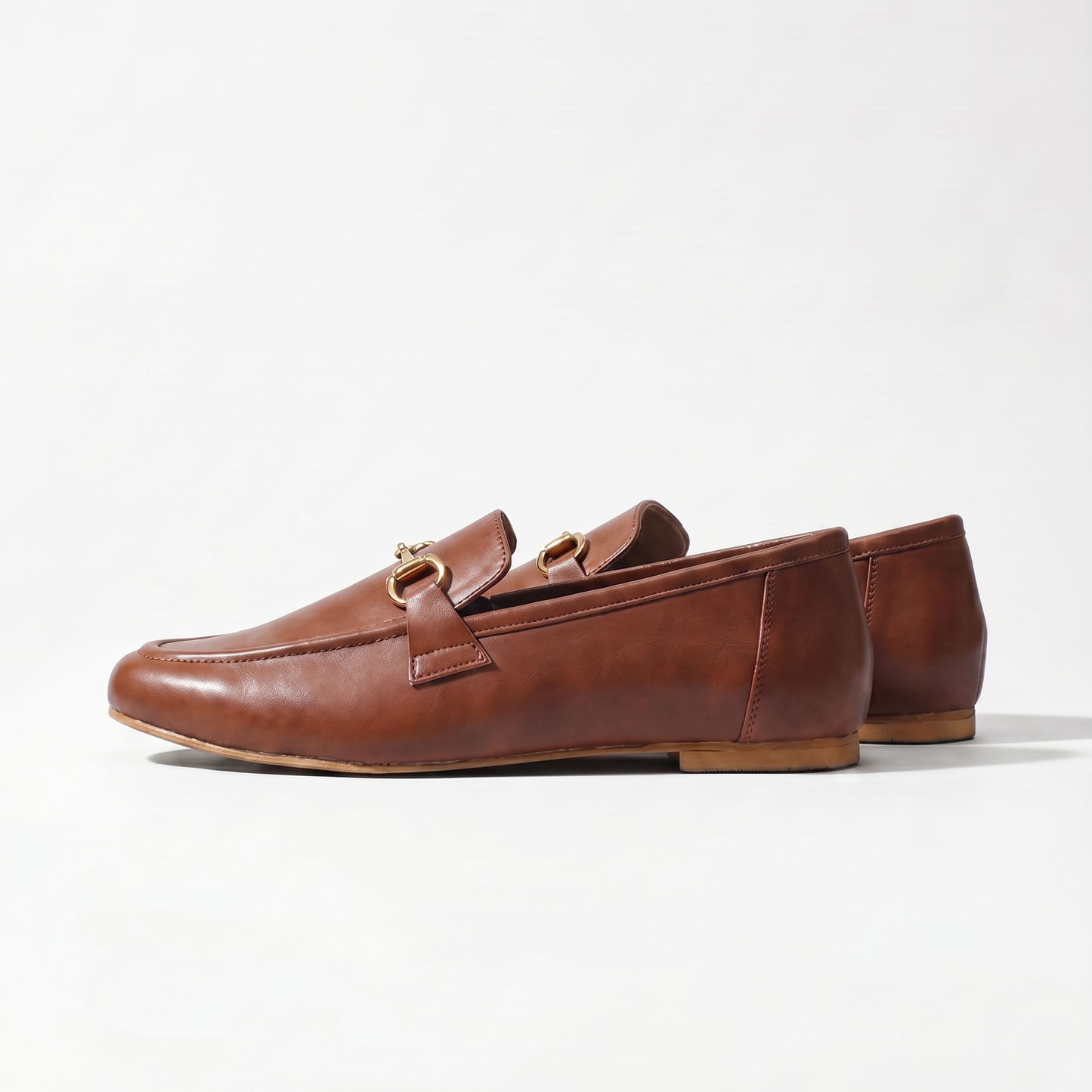 Aura Tan loafers with antique gold Buckle