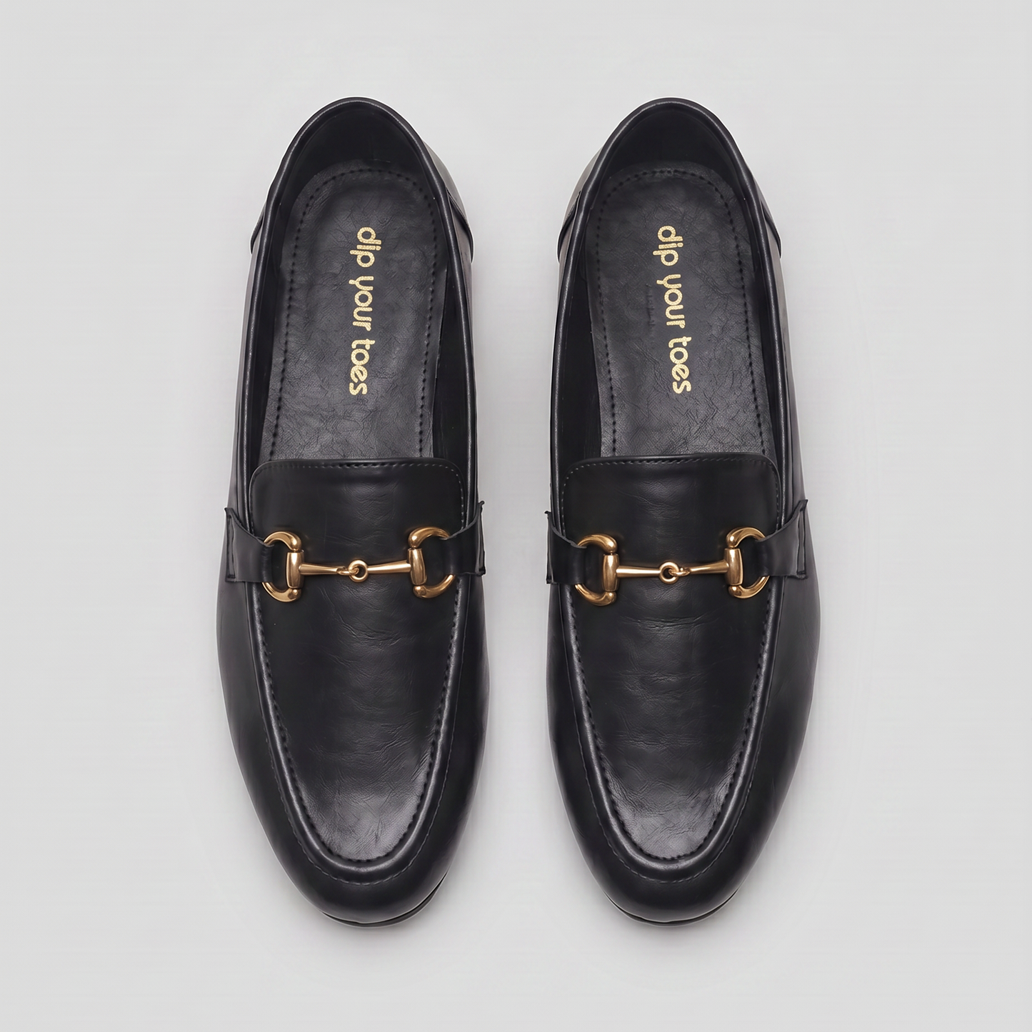 Aura black loafers with antique gold Buckle
