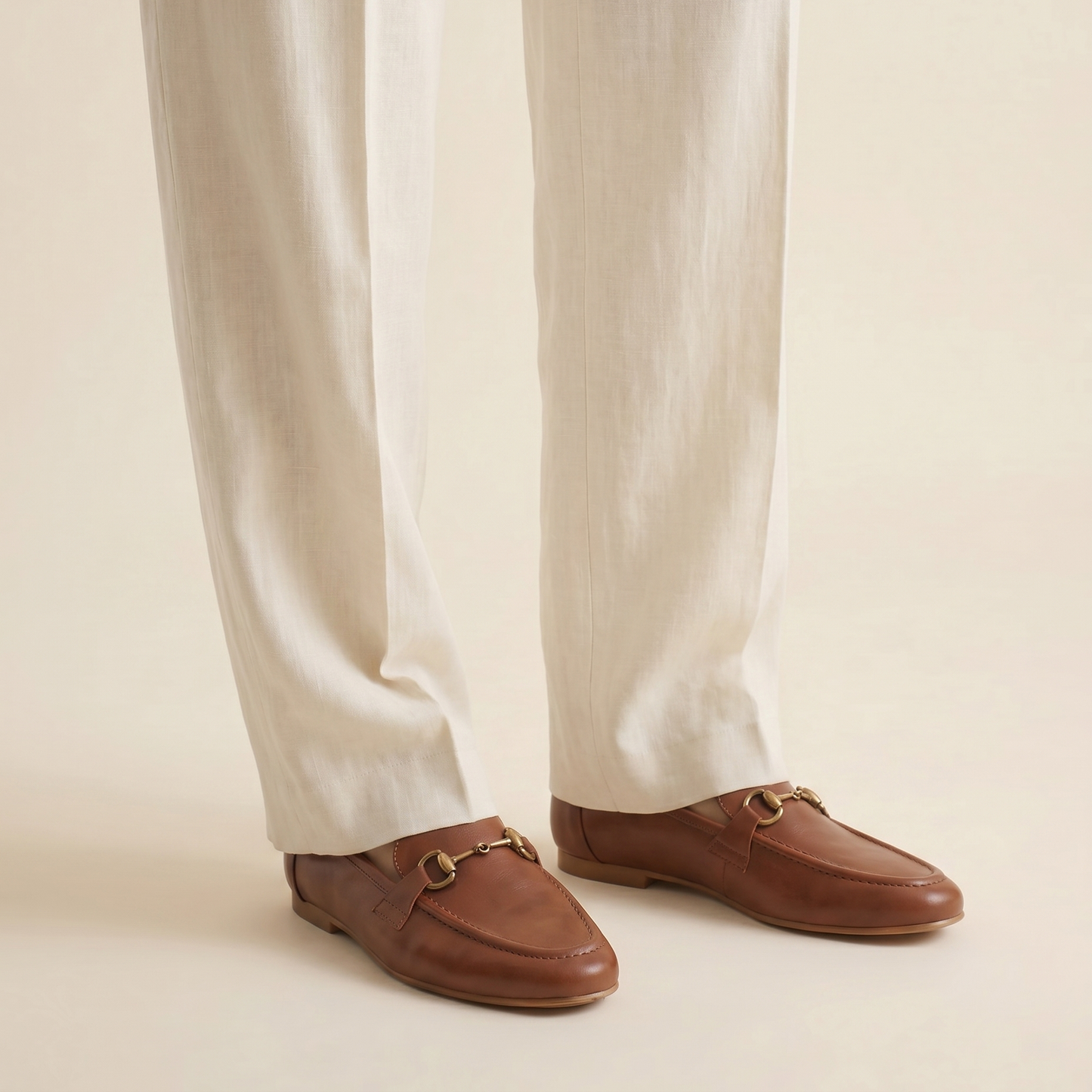 Aura Tan loafers with antique gold Buckle